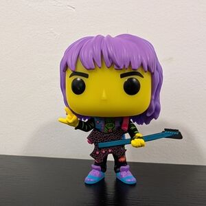 Purple and Yellow Rock Star Figure